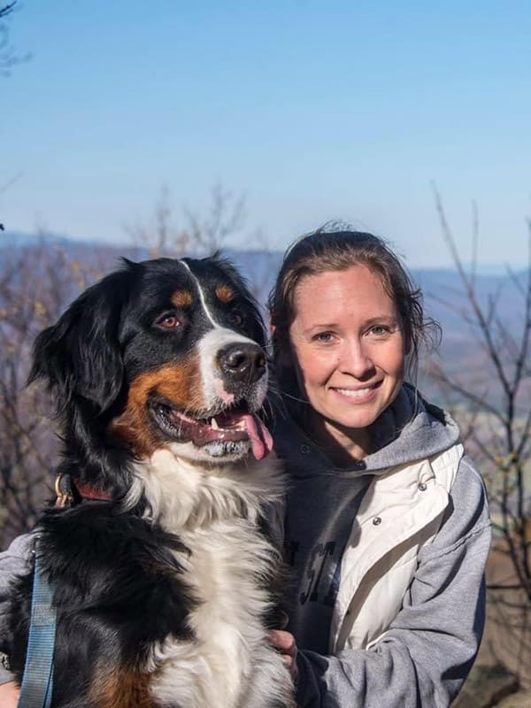 Dr. Anna Matheny with a Bernese Mountain Dog